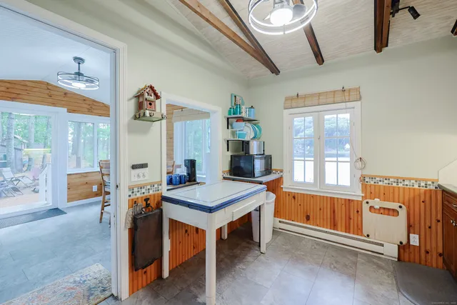 a room with furniture and window