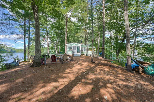 a view of a outdoor space with deck and sitting area