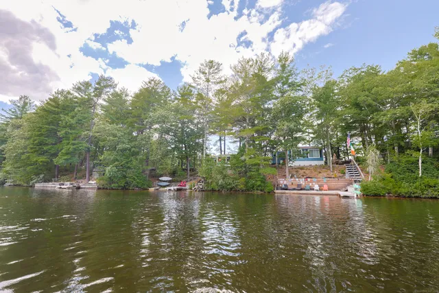 a view of lake with green space