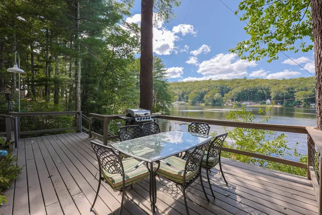 a view of a chairs on the roof deck