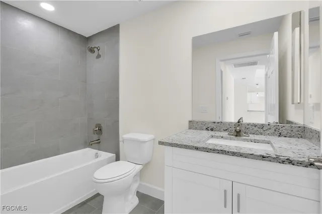 a view of a kitchen with an empty space and a kitchen