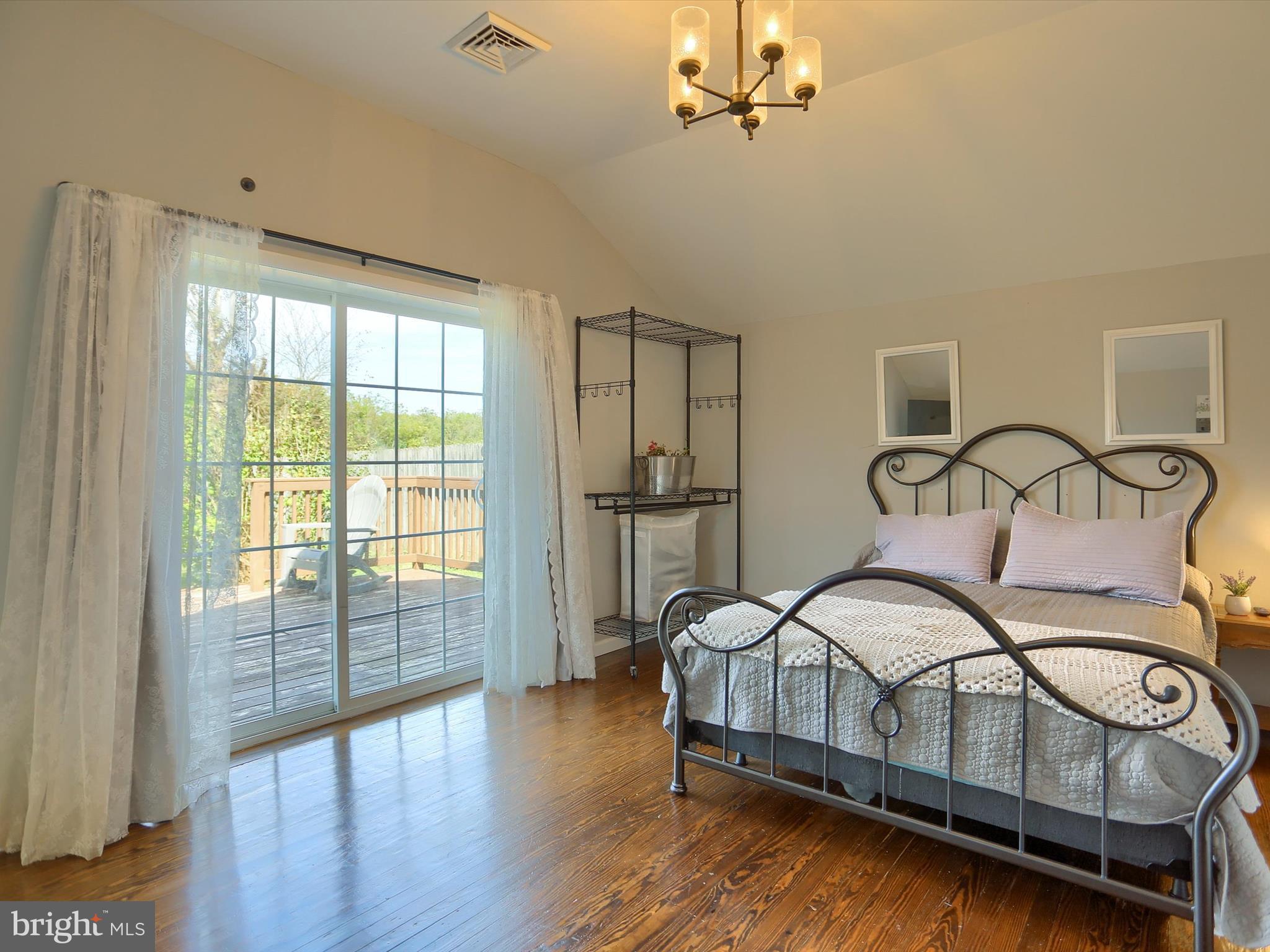 5931 York Road Spring Grove, PA 17362 - Photo 22 of 38 a bedroom with bed and wooden floor