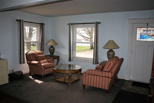 605 North 14th Street Rochelle, IL 61068 - Photo 2 of 12 a living room with furniture and a window
