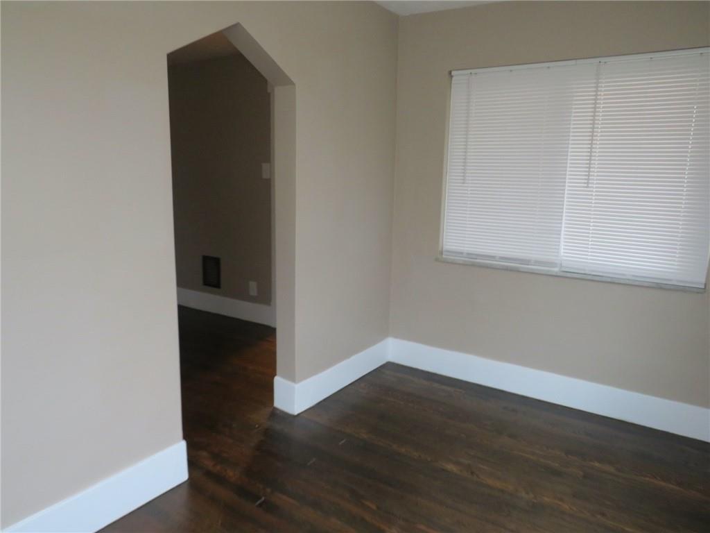 718 Ridge Avenue McKees Rocks, PA 15136 - Photo 7 of 30 a view of a hallway with wooden floor