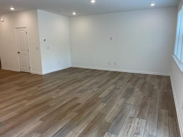 148 Vision Street Bethlehem, GA 30620 - Photo 3 of 8 a view of an empty room with wooden floor