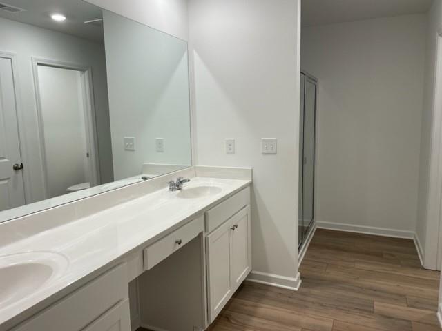 148 Vision Street Bethlehem, GA 30620 - Photo 6 of 8 a bathroom with a sink and a large mirror