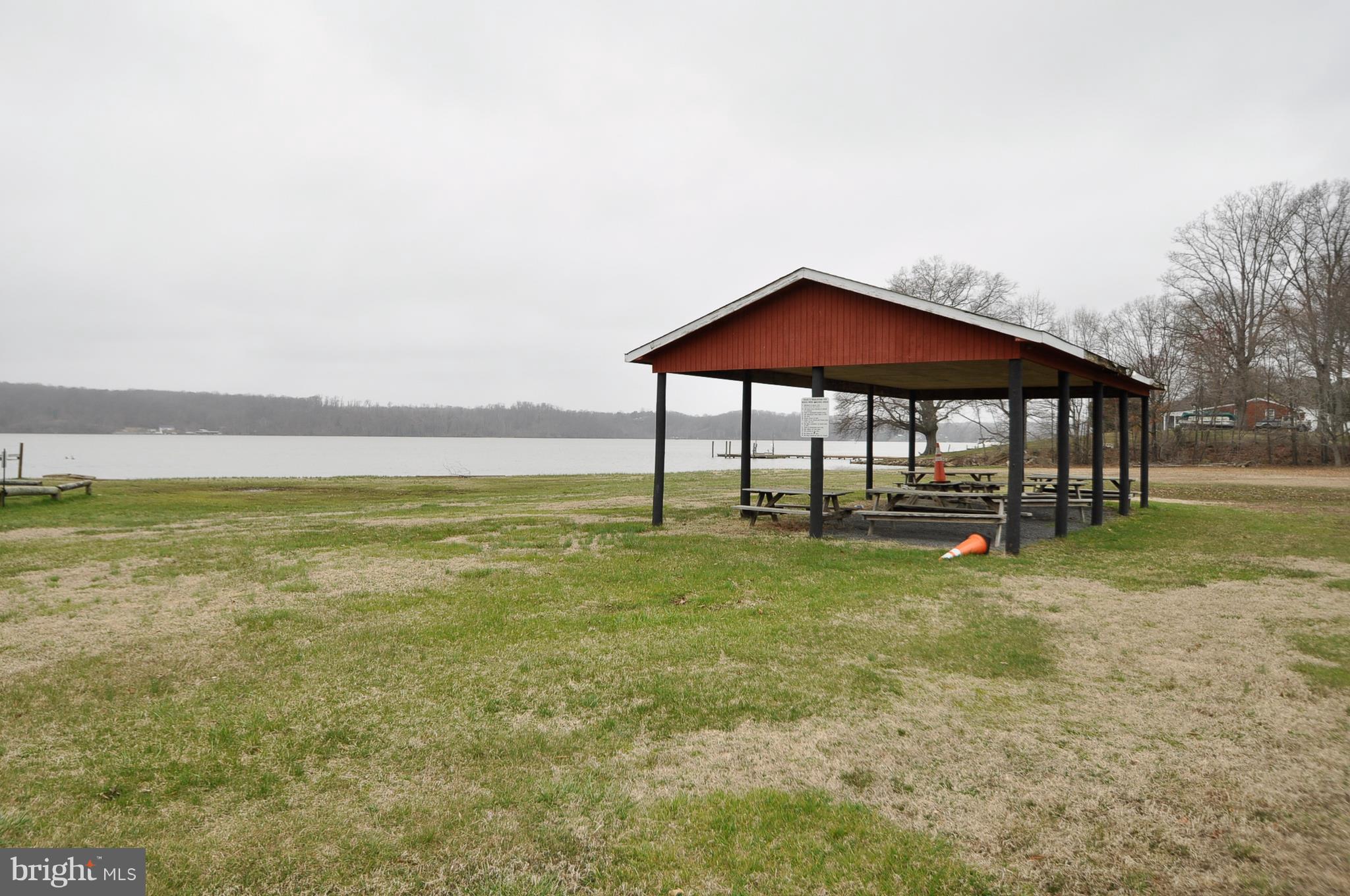 0 Brent Point Road Stafford, VA 22554 - Photo 26 of 28 a view of pool with table and chairs under an umbrella