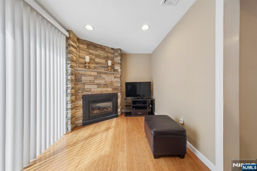 562 Valley Road Clifton, NJ 07013 - Photo 17 of 35 a living room with furniture and a flat screen tv