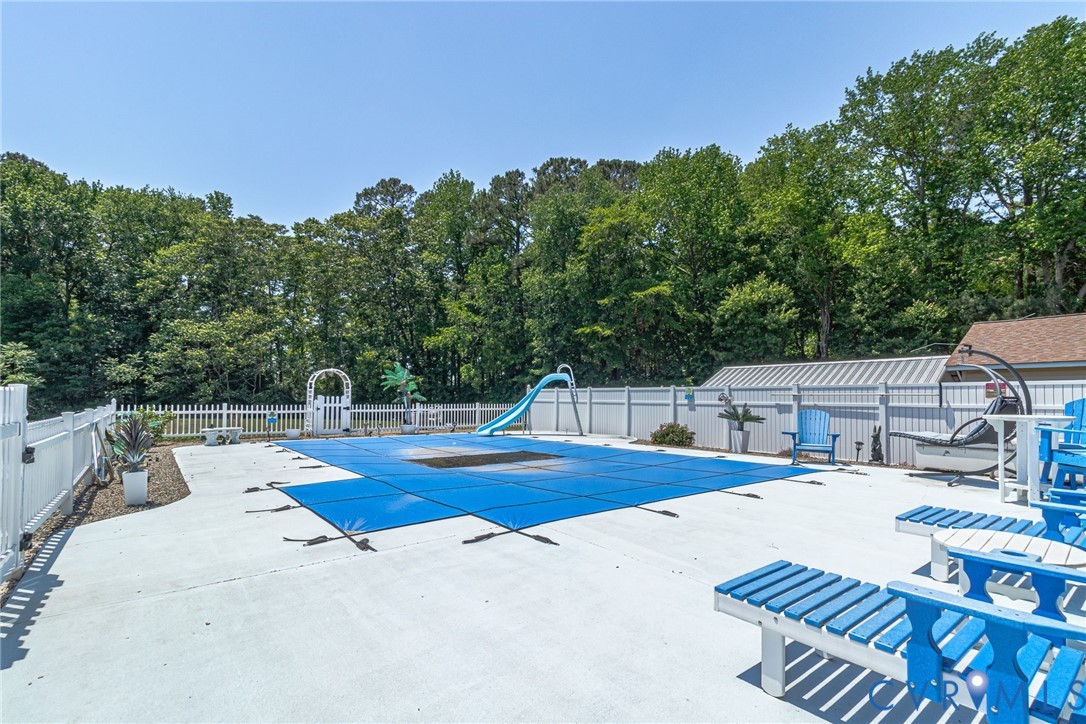 4400 Hacks Neck Road Heathsville, VA 22473 - Photo 67 of 78 a view of a swimming pool with an outdoor seating