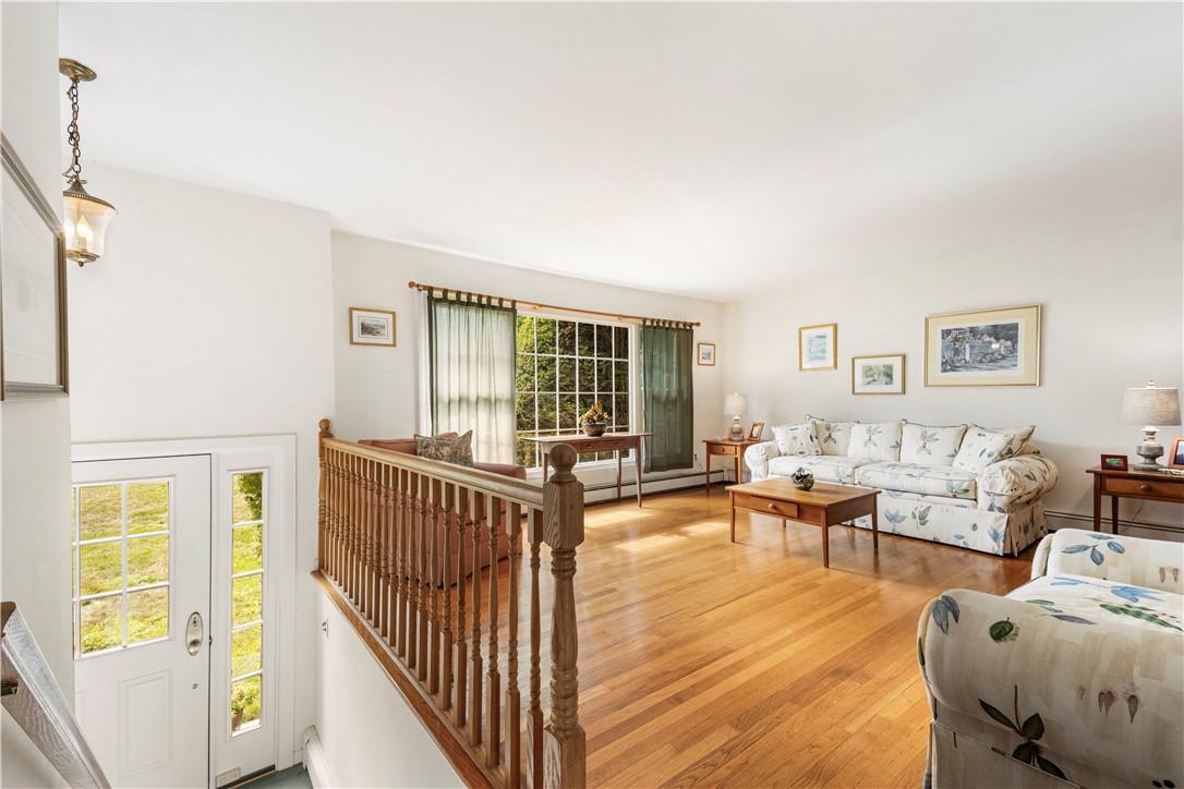 64 Hamlin Road Mahopac, NY 10541 - Photo 1 of 1 a living room with furniture and a window