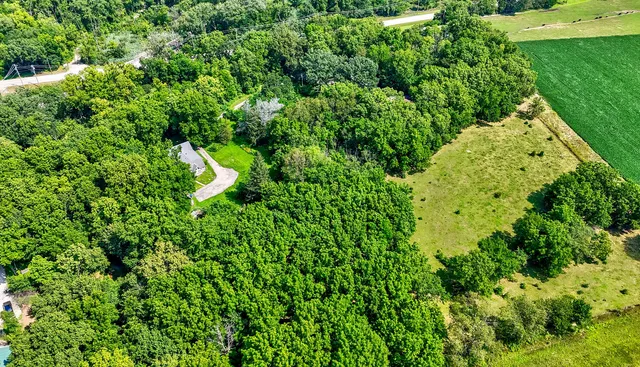 a view of an empty room with gym equipment