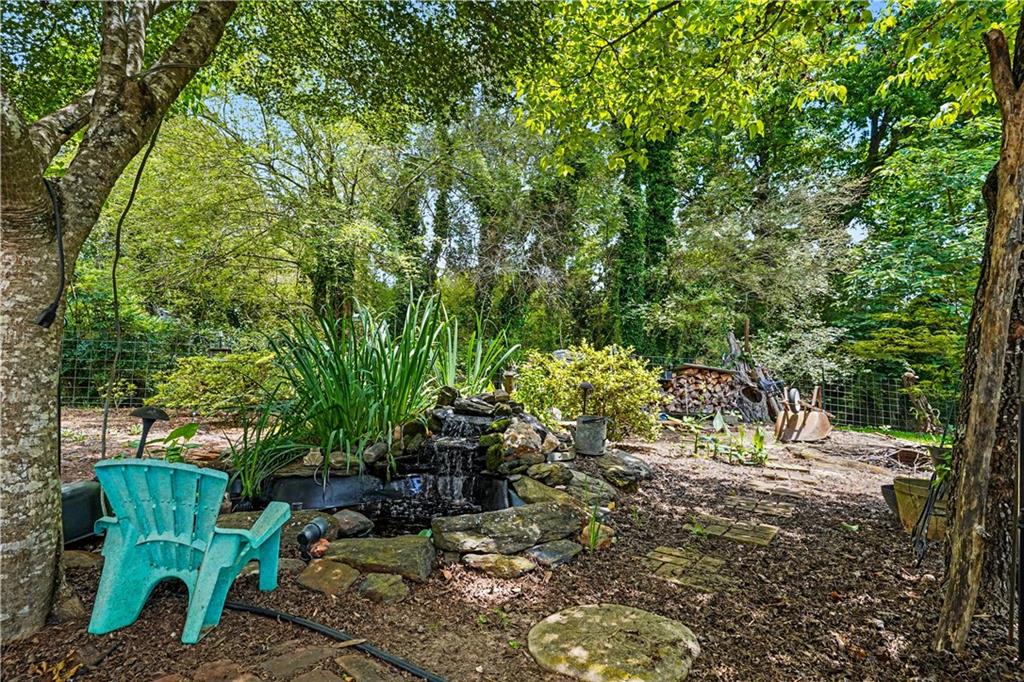 355 Inman Road Hampton, GA 30228 - Photo 35 of 47 a view of backyard with outdoor seating and green space