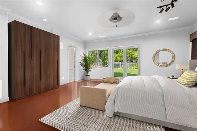 a bed room with a bed and a window