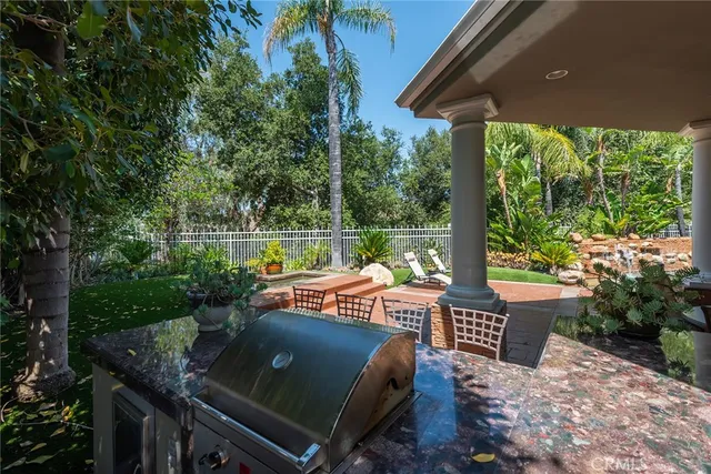 a view of an outdoor sitting area with furniture