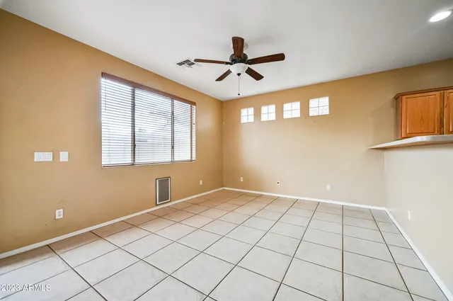 a view of an empty room and window