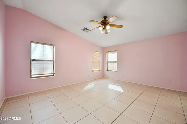 a view of an empty room and window