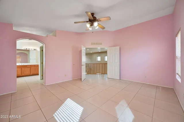 a bathroom with a granite countertop sink a mirror and a vanity