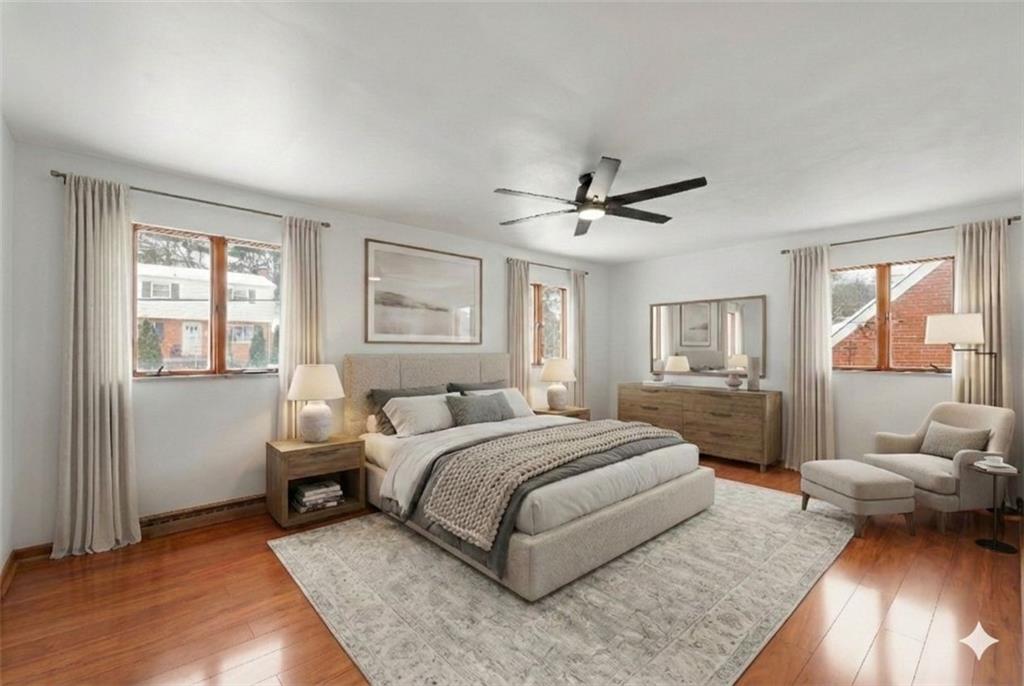 3930 Edge Road Pittsburgh, PA 15227 - Photo 20 of 45 a bedroom with a large bed couch and a window