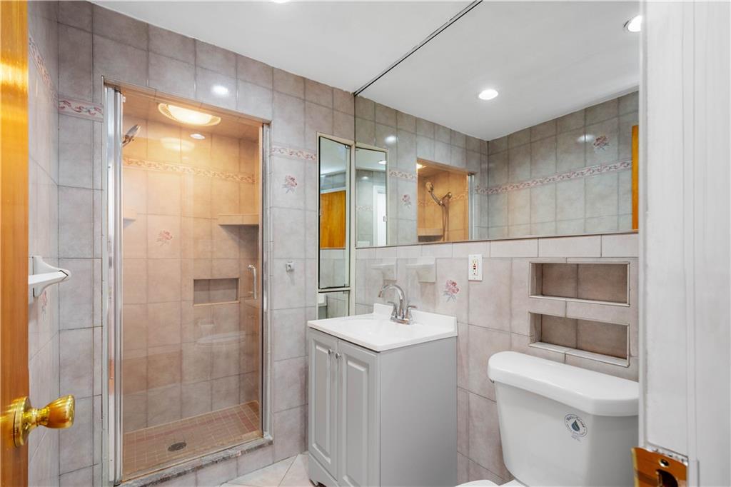 3930 Edge Road Pittsburgh, PA 15227 - Photo 24 of 45 a bathroom with a toilet sink and shower