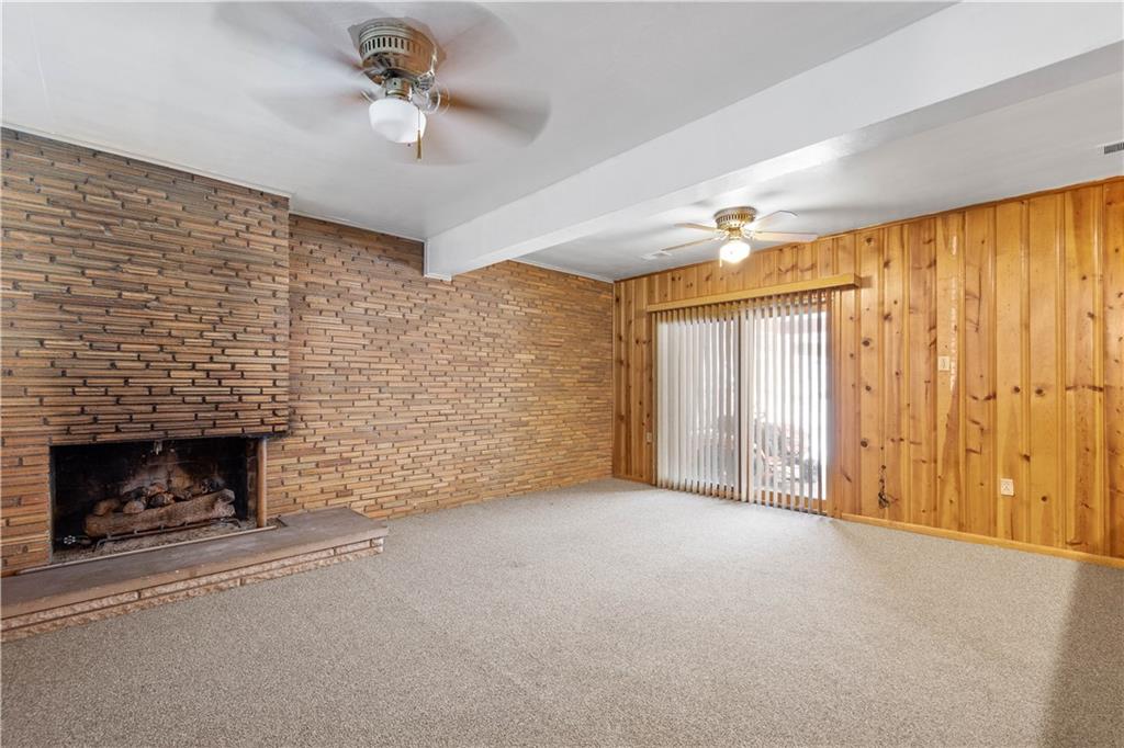 3930 Edge Road Pittsburgh, PA 15227 - Photo 31 of 45 a view of empty room with fireplace and fan
