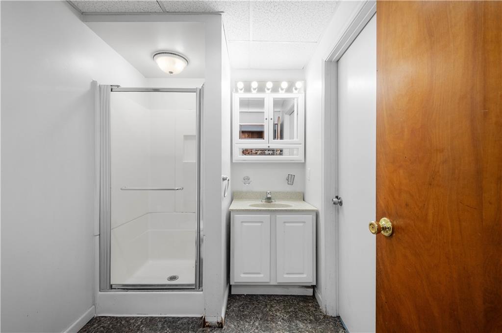 3930 Edge Road Pittsburgh, PA 15227 - Photo 36 of 45 a bathroom with a sink a toilet and shower