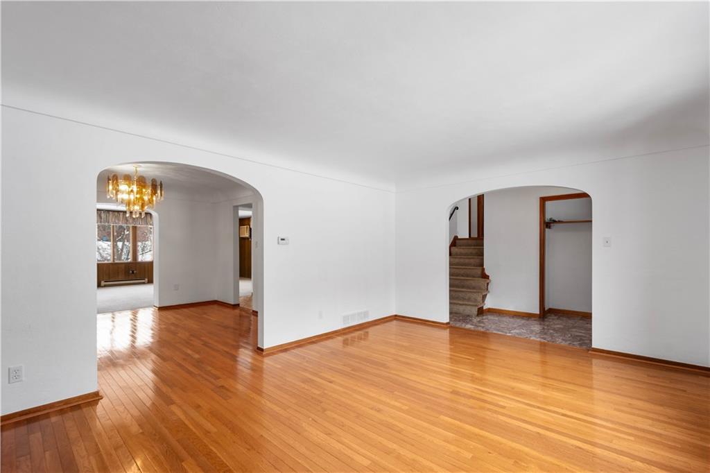 3930 Edge Road Pittsburgh, PA 15227 - Photo 7 of 45 a view of empty room with wooden floor and fan