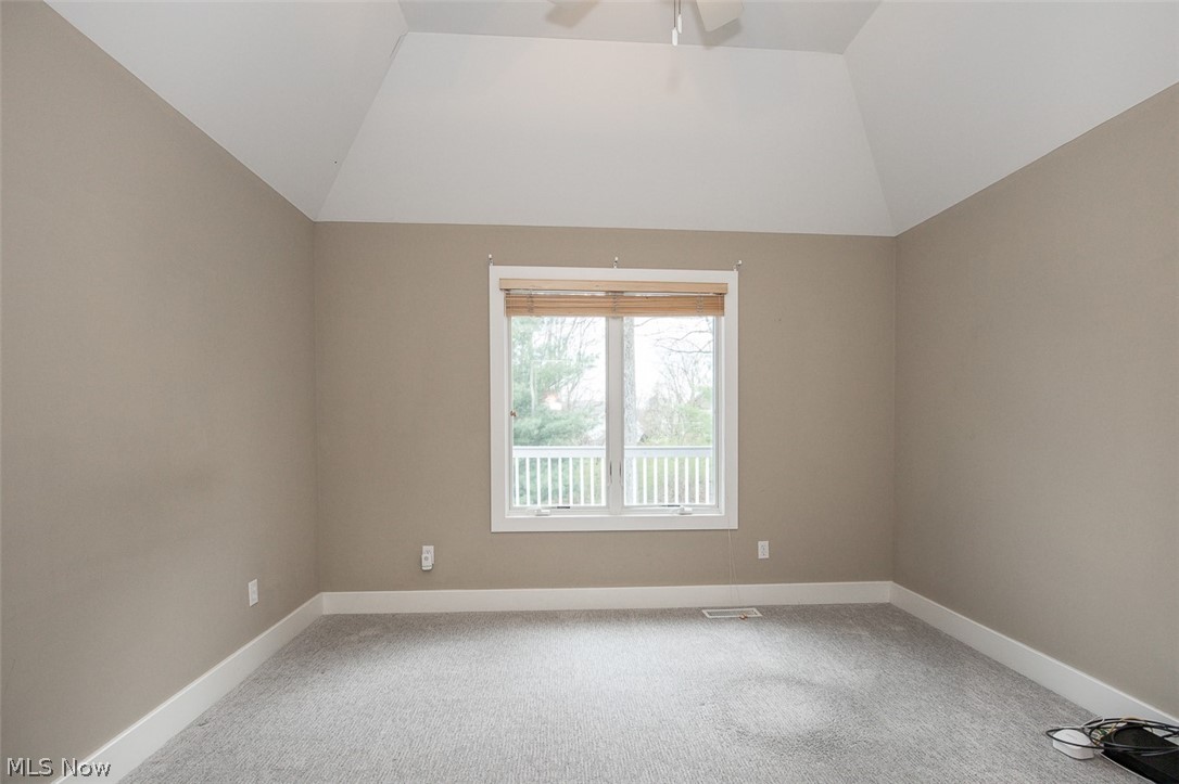 7282 Holzhauer Road Northfield, OH 44067 - Photo 23 of 47 Second guest bedroom with vaulted ceiling