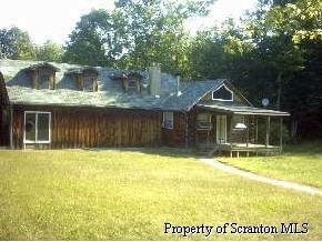 0 Meshoppen Creek Road Meshoppen, PA 18630 - Photo 2 of 5 a view of a house with a swimming pool