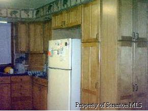 0 Meshoppen Creek Road Meshoppen, PA 18630 - Photo 5 of 5 a kitchen with a refrigerator and countertop