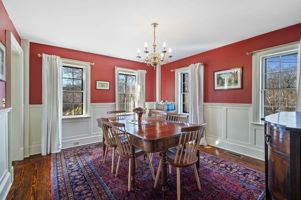9 River Road Topsfield, MA 01983 - Photo 18 of 42 a view of a dining room with furniture window and wooden floor