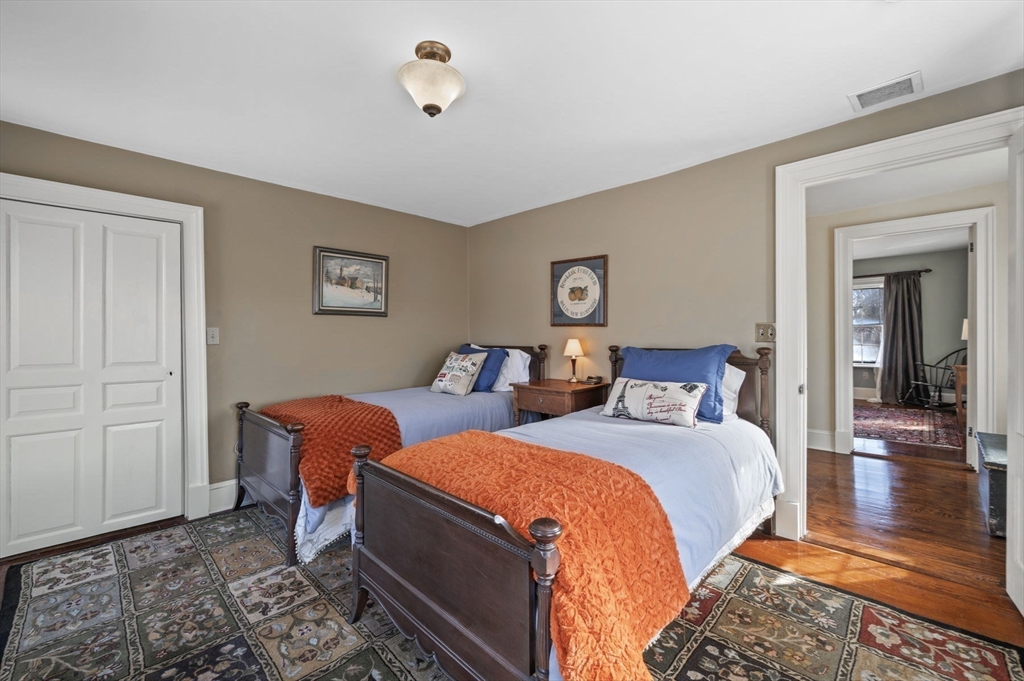 9 River Road Topsfield, MA 01983 - Photo 24 of 42 a bedroom with two beds and painted walls