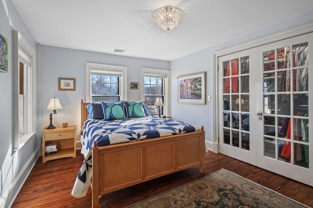 9 River Road Topsfield, MA 01983 - Photo 25 of 42 a bed room with bed and a window