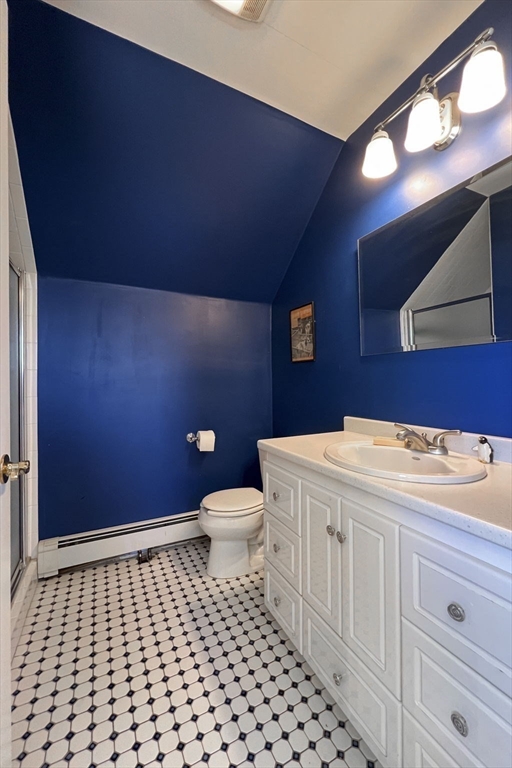 9 River Road Topsfield, MA 01983 - Photo 40 of 42 a bathroom with a sink a toilet and a mirror