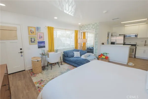 a view of a house with swimming pool and porch