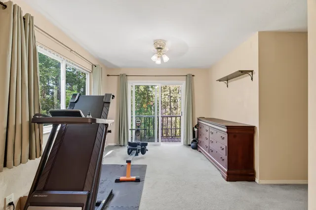 a view of a livingroom with furniture window and outside view