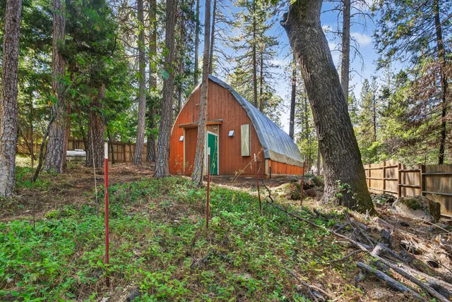 a backyard of a house with lots of green space