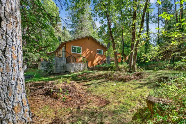 a backyard of a house with lots of green space