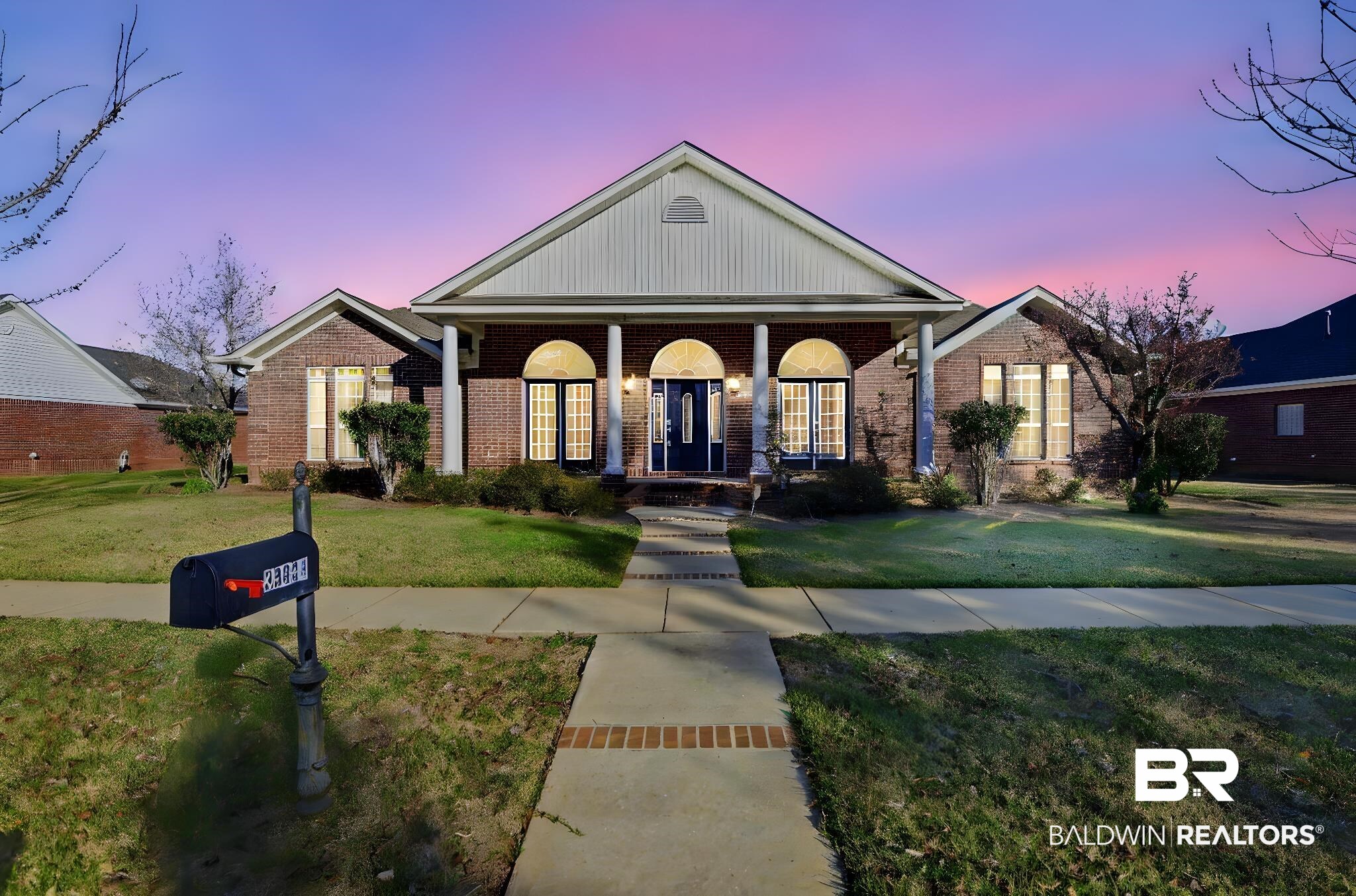 29634 St George Street Daphne, AL 36526 - Photo 2 of 47 Neoclassical / greek revival house with a porch, a yard, and brick siding