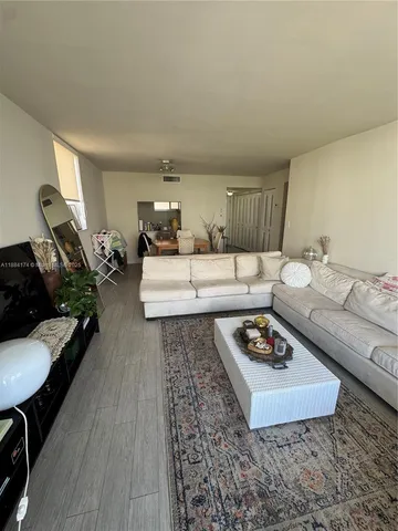 a living room with furniture and a couch