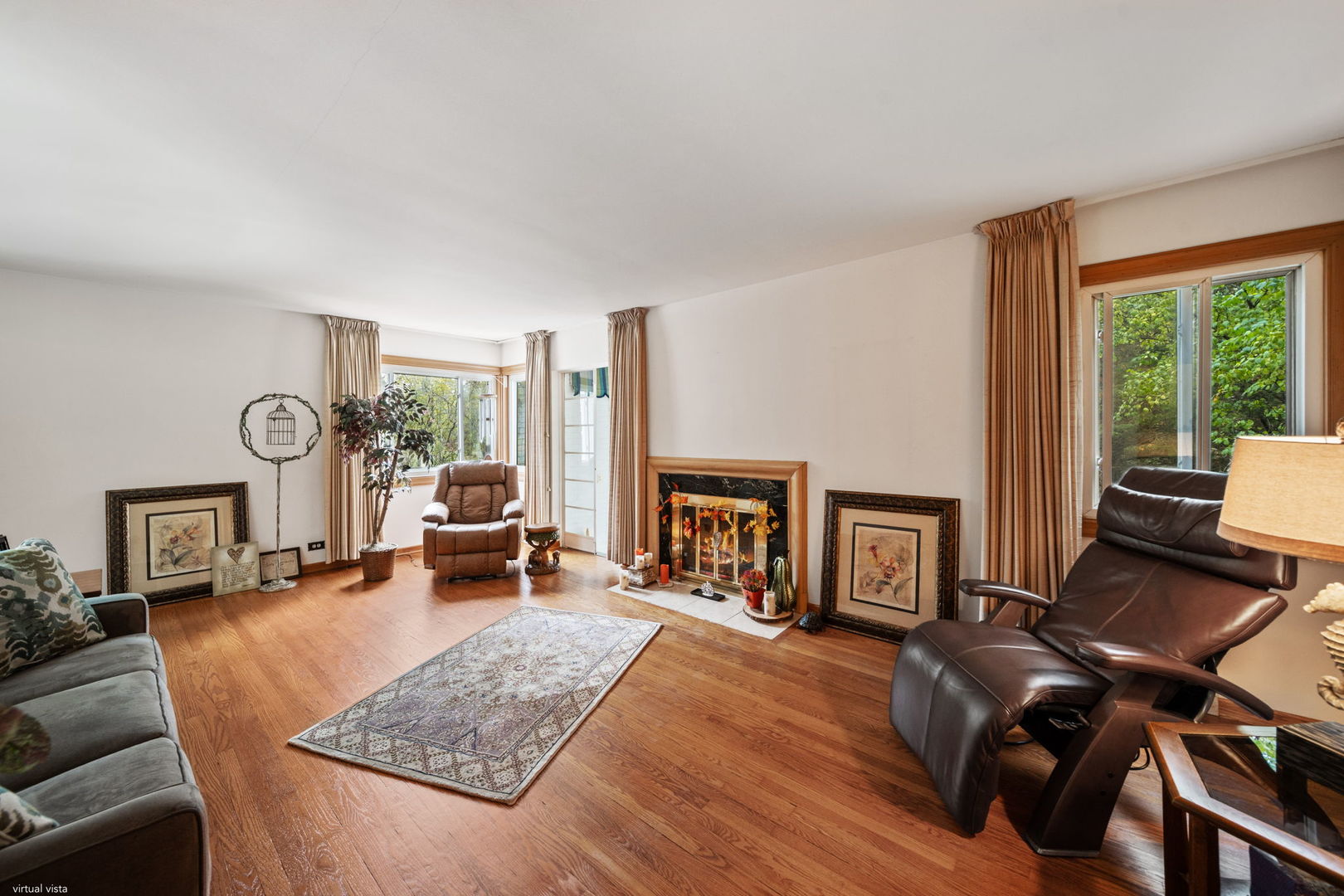 2619 York Road Oak Brook, IL 60523 - Photo 12 of 41 a living room with furniture and a fireplace