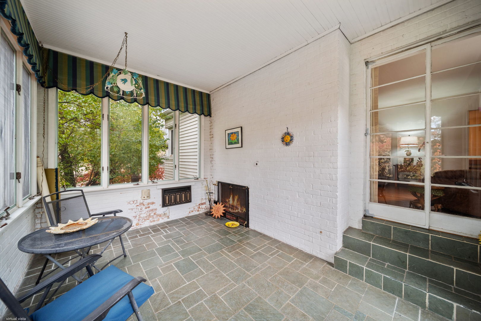 2619 York Road Oak Brook, IL 60523 - Photo 17 of 41 a living room with furniture windows and a fireplace