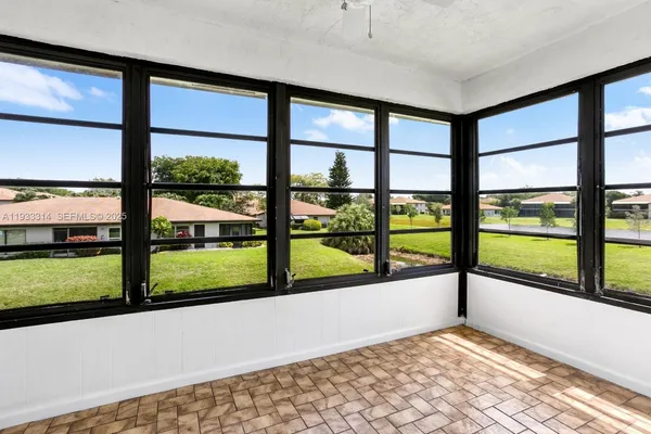a view of a large room with a large window
