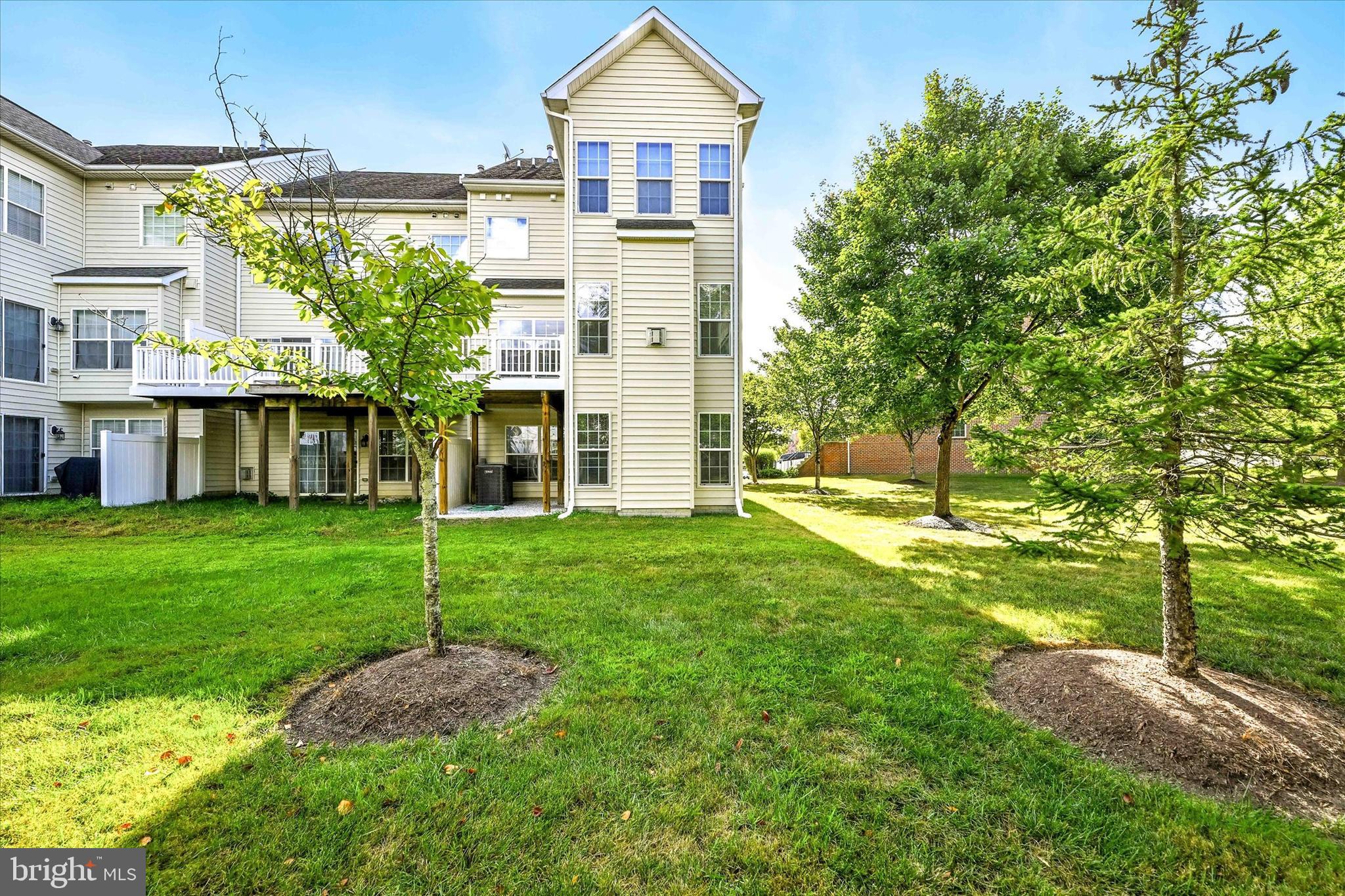 9828 Snow Bird Lane Laurel, MD 20723 - Photo 30 of 30 a front view of a house with a yard and trees
