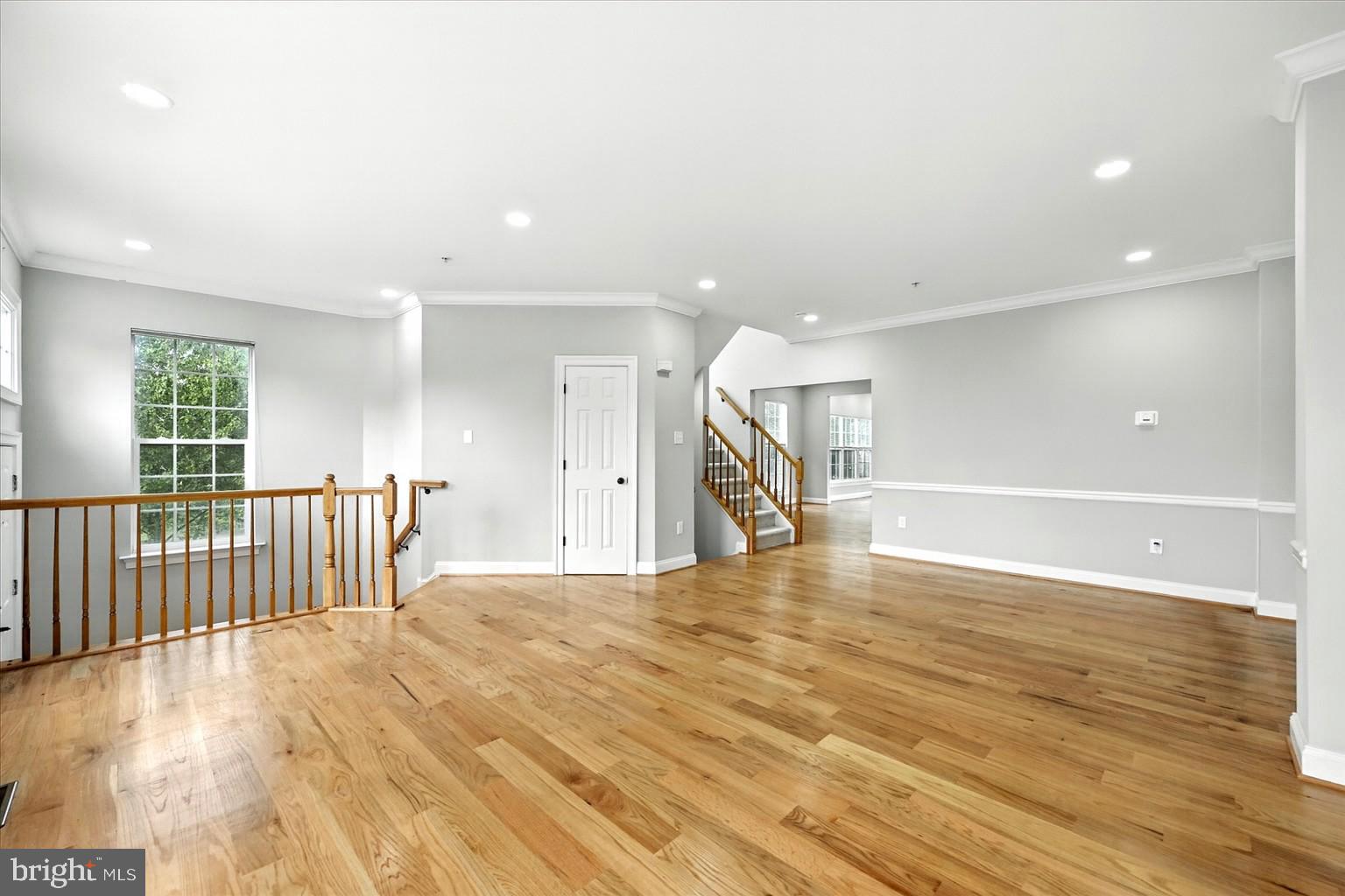 9828 Snow Bird Lane Laurel, MD 20723 - Photo 5 of 30 a view of an empty room with wooden floor
