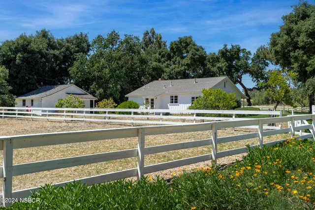 a view of building with tree in the background