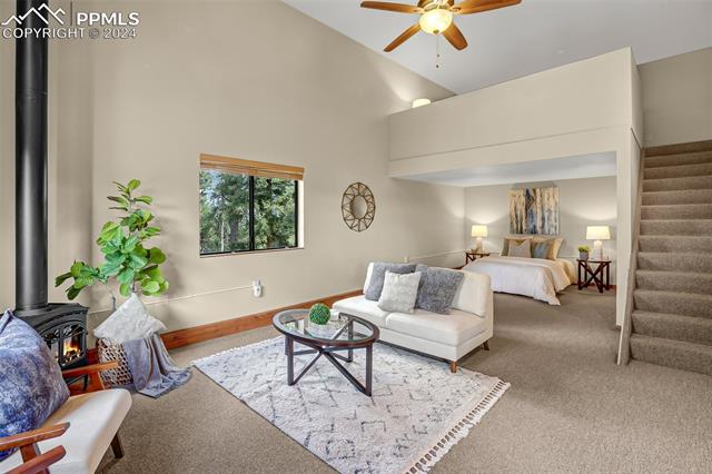 2755 Elk Ridge South Divide, CO 80814 - Photo 13 of 14 Bonus studio space with soaring ceilings up to loft, cozy fireplace, kitchenette, and en suite