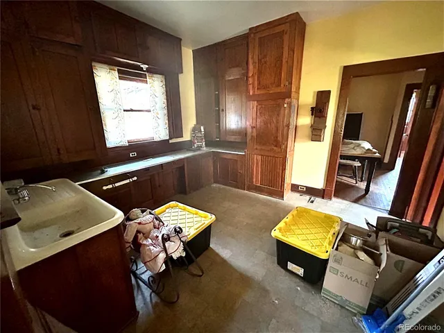 a room with furniture and a window