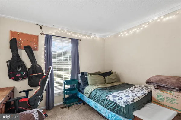 a living room with furniture fireplace and a flat screen tv