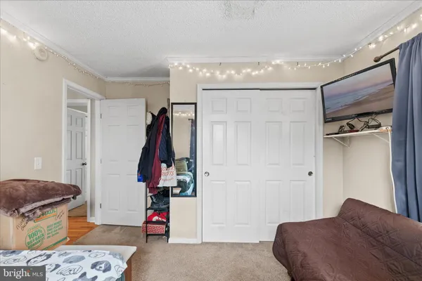 a view of livingroom with furniture and staircase