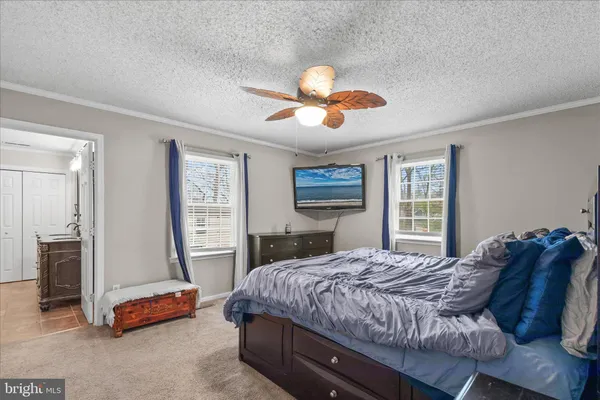 a room with furniture and white walls